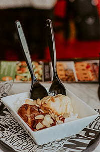 brown and white ice cream on white ceramic bowl thumbnail