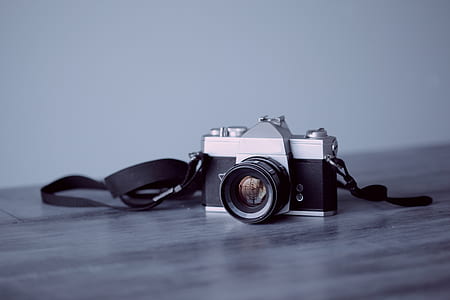 black and gray SLR camera thumbnail