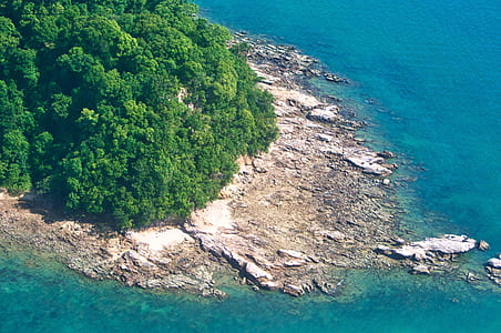 aerial view photography of island during daytime thumbnail