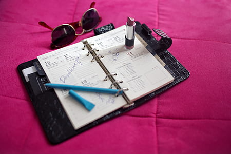 lipstick on black organizer notebook thumbnail