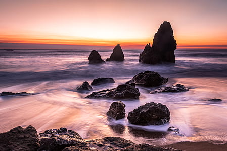 time lapse photography of waves crashing on shore thumbnail