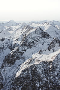 aerial view of mountain covered with snow thumbnail