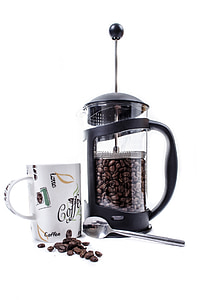 black French press near ceramic mug thumbnail