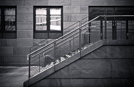 greyscale photography of empty stair set with railings thumbnail