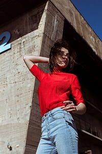 women's red top during daytime thumbnail