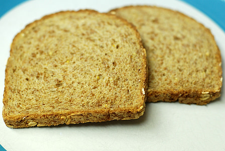 two sliced breads on white surface thumbnail