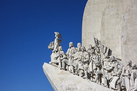 concrete statues under clear sky at daytime thumbnail