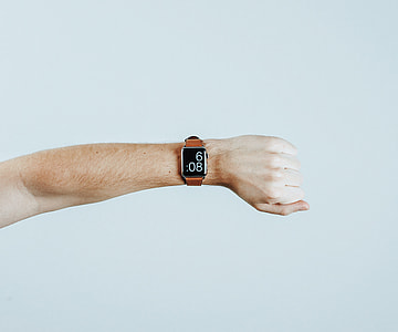 person arm wearing Apple Watch thumbnail