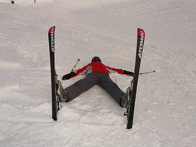 person lying on snowfield thumbnail