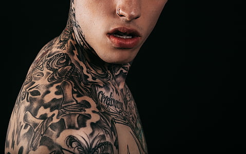 photography of man with tattoos thumbnail