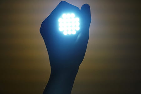 person holding LED lights thumbnail