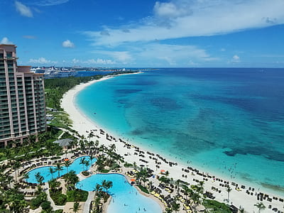 bird eye view photography of high-rise building near body of water thumbnail