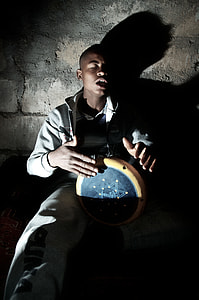 man in black and gray clothes playing percussion drum thumbnail