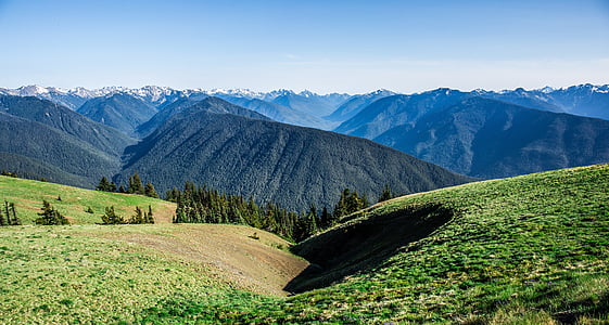 sunlight over green mountains thumbnail