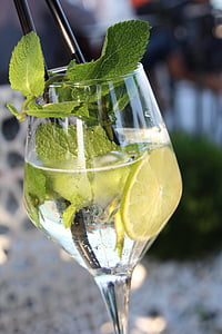 clear wine glass with clear liquid in it thumbnail
