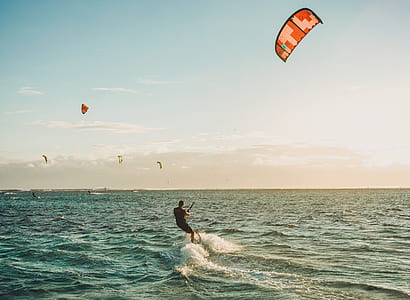 man parasurfer during daytime thumbnail