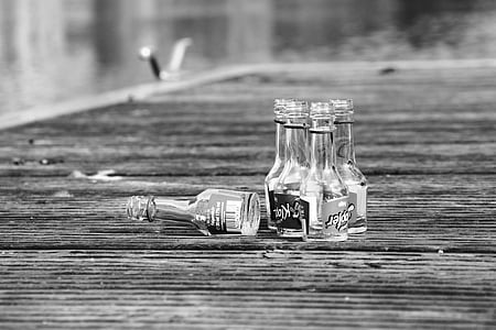 bottles on wooden surface thumbnail
