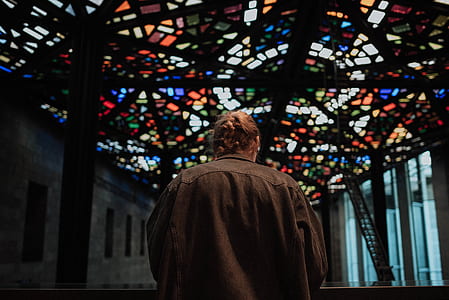 person standing in front of altar thumbnail