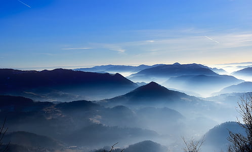 mountains with fogs at daytime thumbnail