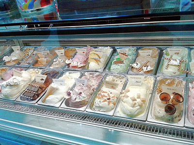 cakes and chocolate inside the display case thumbnail