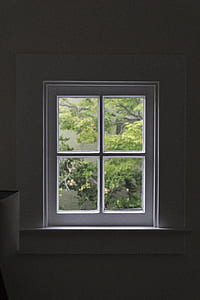 white wooden 4-pane window inside dark room thumbnail