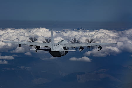 white airliner soaring on white clouds thumbnail