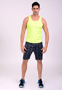 man in green tank top and black shorts costume thumbnail
