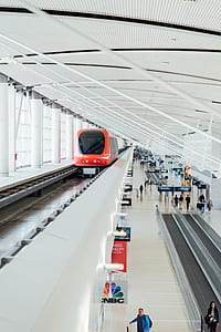 red and black train on railway thumbnail