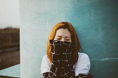 woman covering her face thumbnail