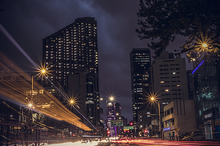 high rise building at nighttime thumbnail