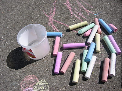 photo of assorted-color chalks on floor thumbnail