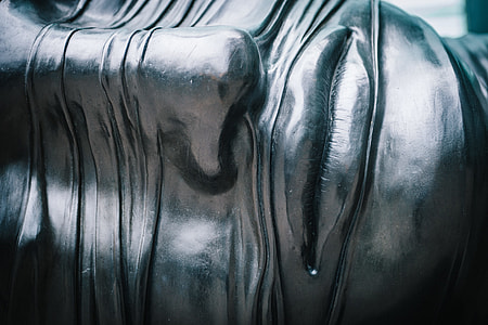 silver human face sculpture thumbnail