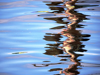 Vivid blue abstract wavy water reflection background thumbnail