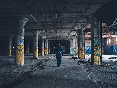man standing on building thumbnail