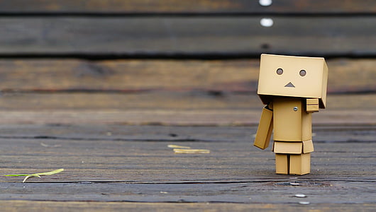 brown cardboard box robot on wooden bench thumbnail