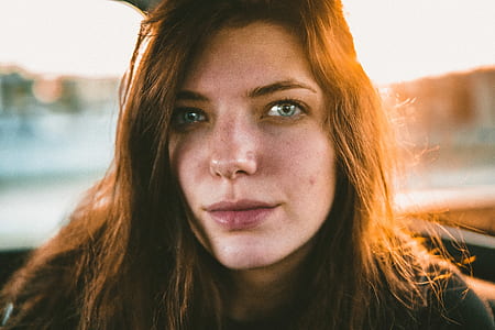 tilt-shift lens photo of woman's face thumbnail