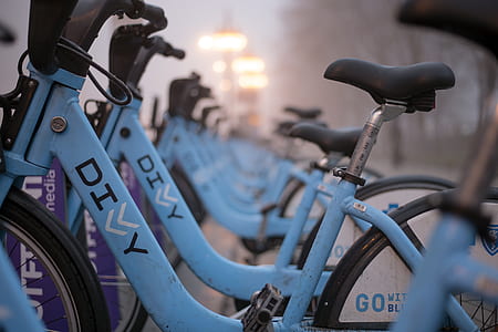 row of blue bicycles thumbnail