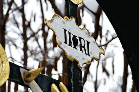 white and yellow INRI sign thumbnail