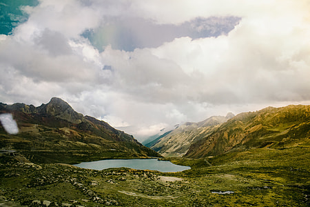 mountain at cloudy sky thumbnail