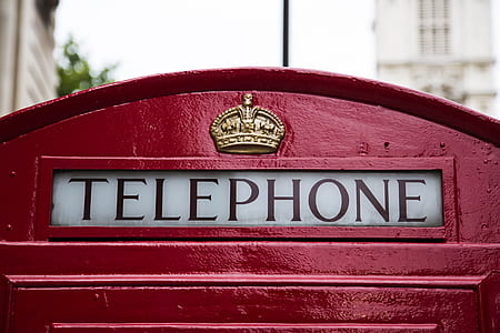 red and white Telephone booth sign thumbnail