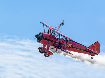 red and black biplane thumbnail