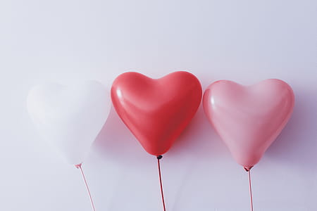 Three balloons in the shape of a heart. Beautiful Valentine’s Day thumbnail