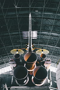 black and brown metal rocket butt inside building thumbnail