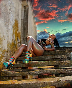 woman sitting on concrete stairway painting thumbnail