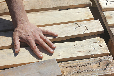 person holding beige wooden palette thumbnail