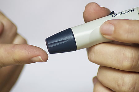person holding blood pik device thumbnail