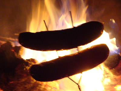 two sausages on firepit thumbnail