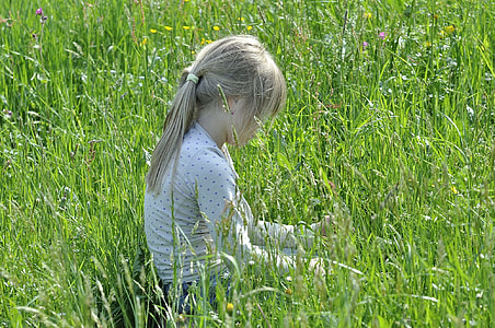 girl on grass field thumbnail