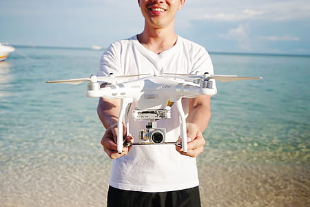 man holding DJI Phantom 3 Professional thumbnail