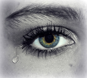 Teardrop falling out of blue eye thumbnail